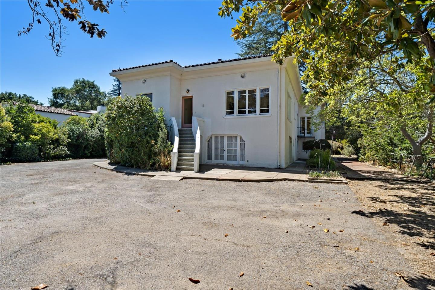 167 Almendral Avenue Atherton, CA 94027 - Photo 30 of 50 a view of a house with a backyard