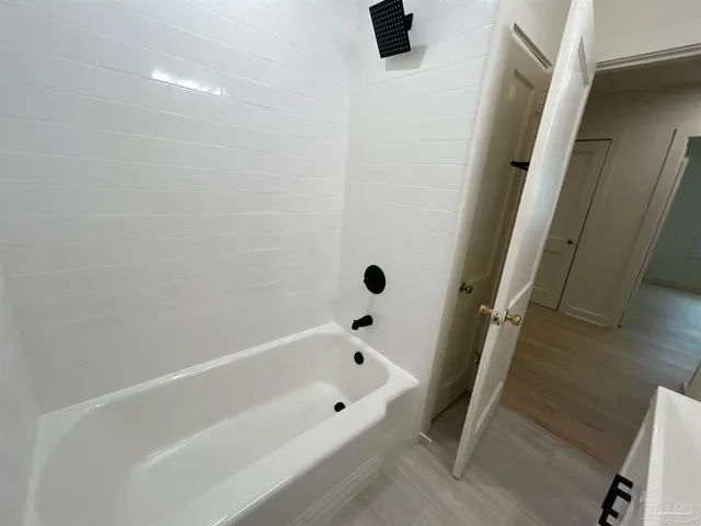 a bathroom with a bathtub