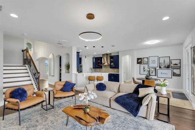 a large kitchen with wooden cabinets and stainless steel appliances