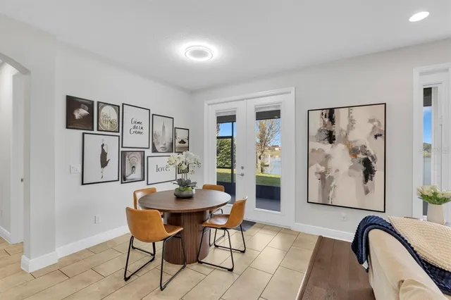 a kitchen with stainless steel appliances granite countertop a sink and cabinets