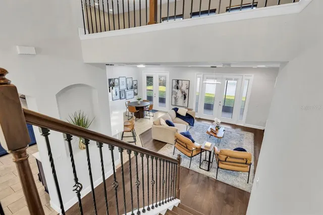 a bedroom with two beds and a night stand