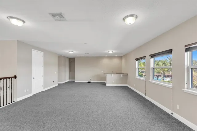 a bathroom with a shower and a toilet