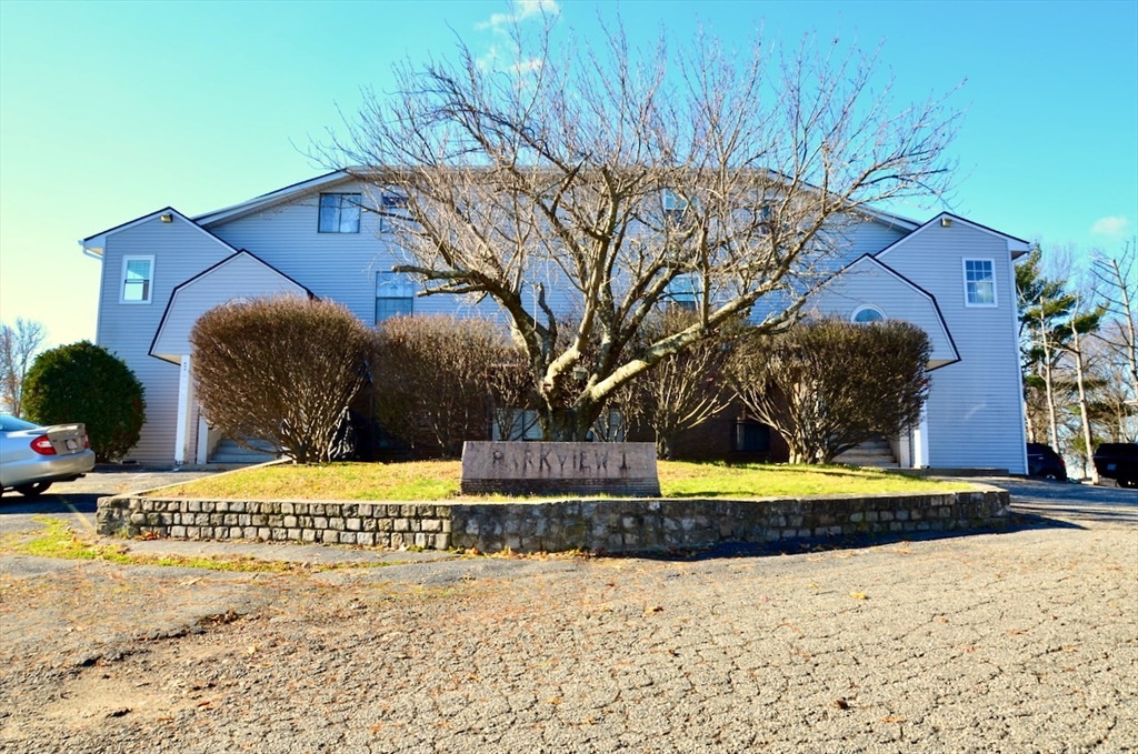 444 Woodward Road, Unit 32 North Providence, RI 02904 - Photo 12 of 15 a view of a street with a building in the background