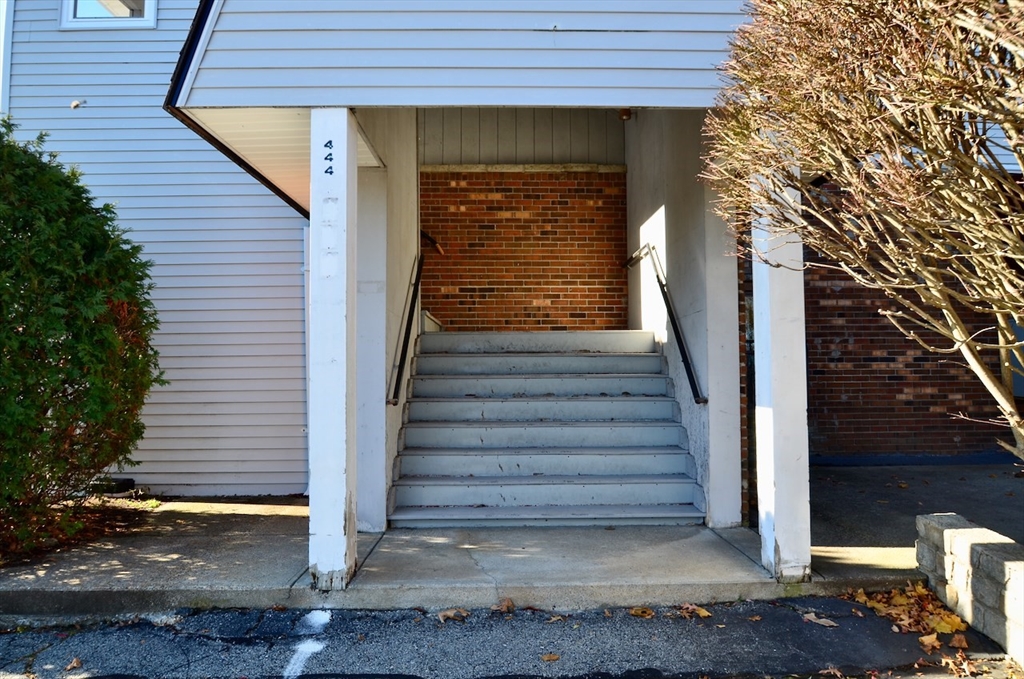 444 Woodward Road, Unit 32 North Providence, RI 02904 - Photo 13 of 15 a view of entryway with wooden door