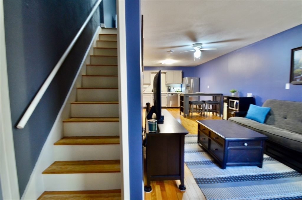 444 Woodward Road, Unit 32 North Providence, RI 02904 - Photo 2 of 15 a room with lots of furniture and entryway
