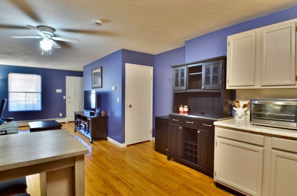 444 Woodward Road, Unit 32 North Providence, RI 02904 - Photo 6 of 15 a kitchen with a sink stove and refrigerator