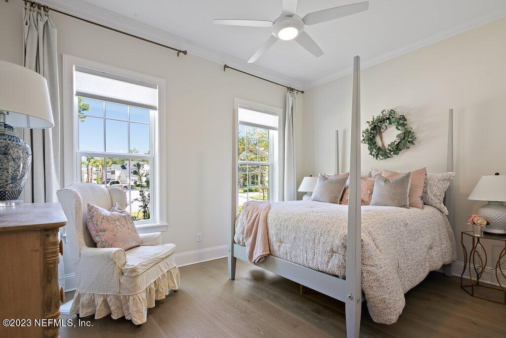 367 Shadow Cove St. Johns, FL 32259 - Photo 21 of 73 a bedroom with a bed and a couch