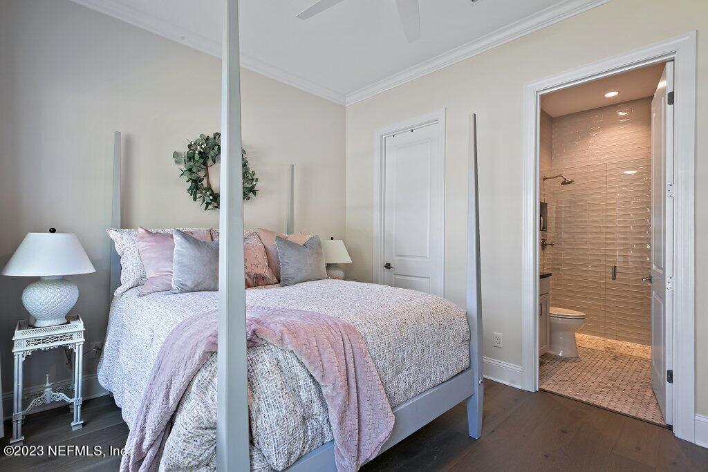 367 Shadow Cove St. Johns, FL 32259 - Photo 22 of 73 a bedroom with a bed and a potted plant on the dresser