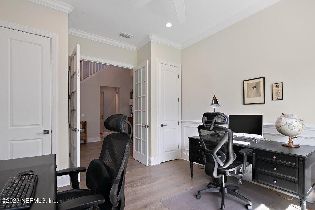 367 Shadow Cove St. Johns, FL 32259 - Photo 25 of 73 a view of a workspace with furniture and wooden floor