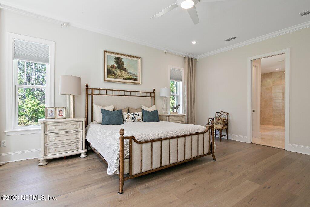 367 Shadow Cove St. Johns, FL 32259 - Photo 29 of 73 a bedroom with a bed and a window