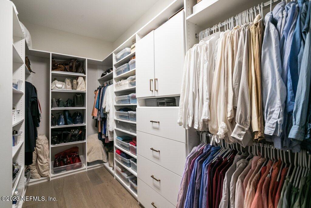 367 Shadow Cove St. Johns, FL 32259 - Photo 36 of 73 a view of walk in closet with clothes and shoes