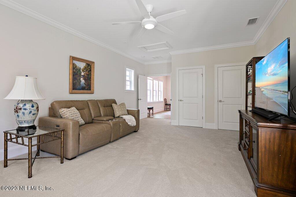 367 Shadow Cove St. Johns, FL 32259 - Photo 39 of 73 a living room with furniture and a flat screen tv
