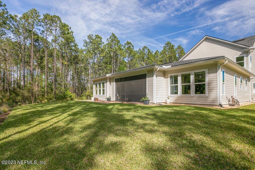 367 Shadow Cove St. Johns, FL 32259 - Photo 53 of 73 front view of a house with a yard