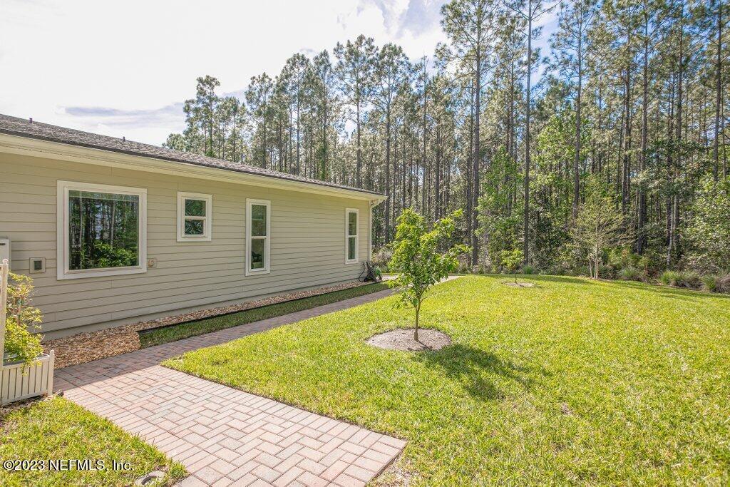 367 Shadow Cove St. Johns, FL 32259 - Photo 55 of 73 a view of a backyard with swimming pool