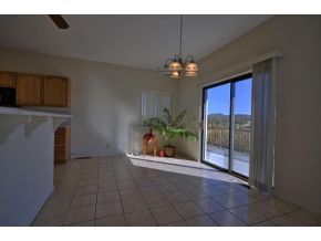16901 Crossroads Ranch Road, Unit 2 Prescott, AZ 86305 - Photo 6 of 12 a view of an empty room with a window