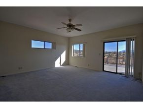 16901 Crossroads Ranch Road, Unit 2 Prescott, AZ 86305 - Photo 8 of 12 a view of an empty room with a window