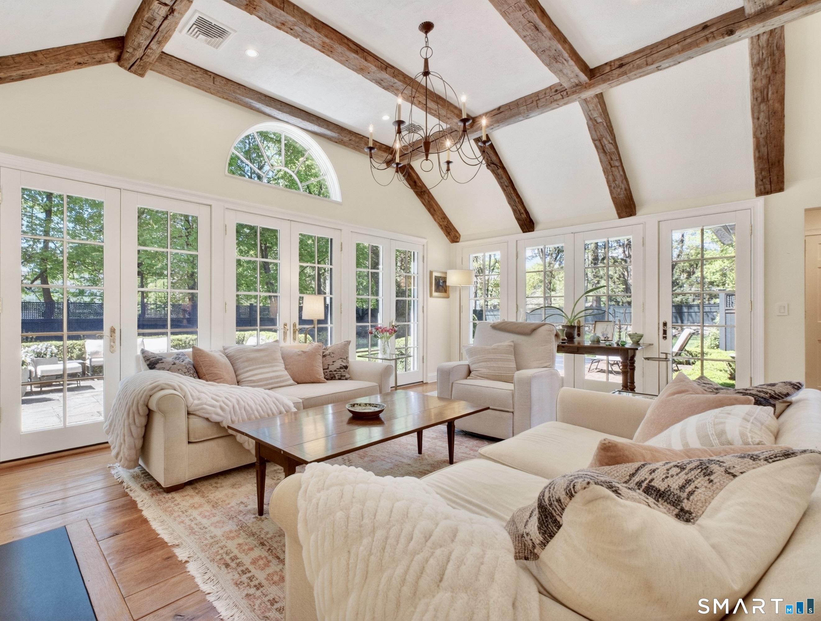 41 Peaceable Street Ridgefield, CT 06877 - Photo 22 of 40 a living room with furniture and large windows