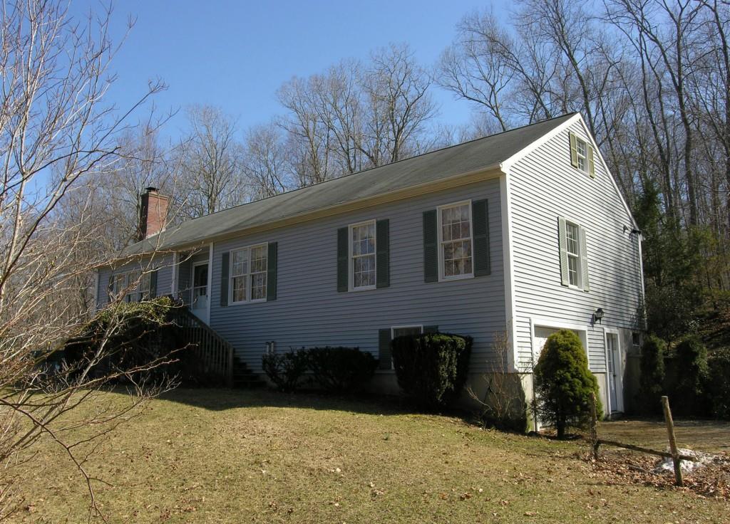 198 A Branch Hill Road Preston, CT 06365 - Photo 1 of 1 a backyard of a house with potted plants and trees