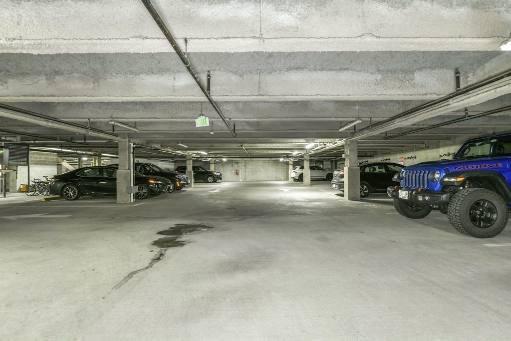3531 Washington Street, Unit 226 Boston, MA 02130 - Photo 27 of 35 a view of parking garage with cars