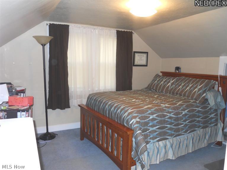 17540 Kinsman Road Middlefield, OH 44062 - Photo 11 of 16 2nd floor bedroom offers great storage and built in closet
