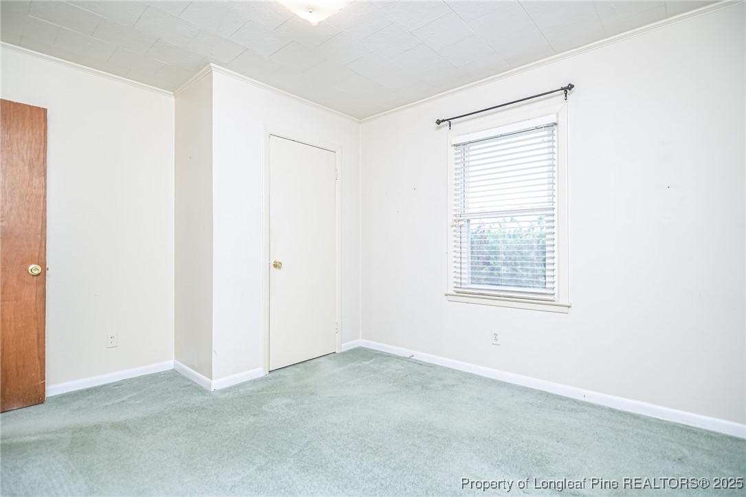 2067 Wade-Stedman Road Stedman, NC 28391 - Photo 23 of 29 a view of an empty room with a window