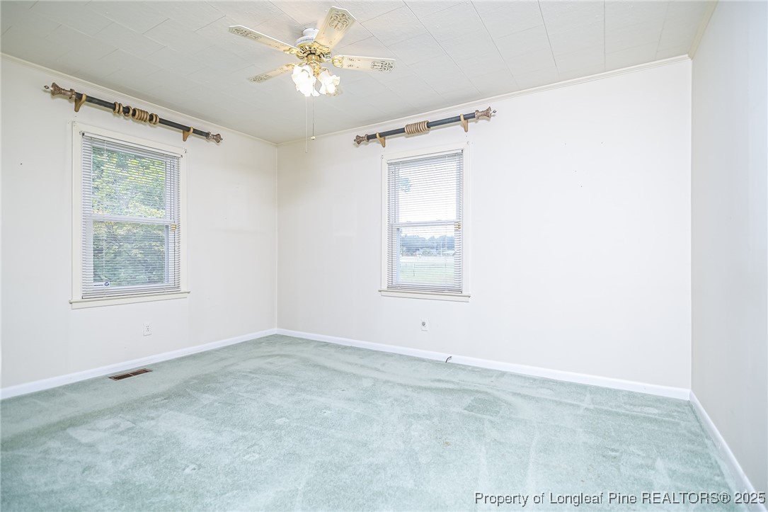 2067 Wade-Stedman Road Stedman, NC 28391 - Photo 25 of 29 a view of an empty room with a window