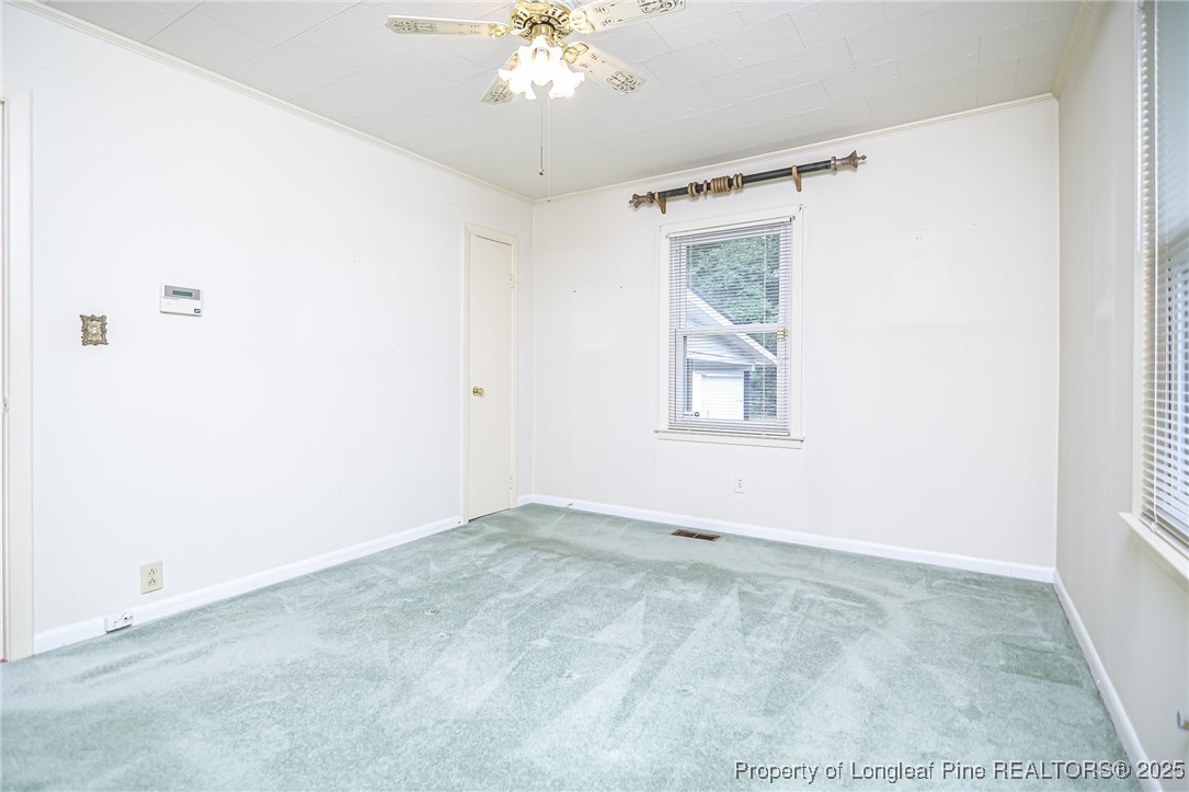 2067 Wade-Stedman Road Stedman, NC 28391 - Photo 26 of 29 a view of an empty room with a window