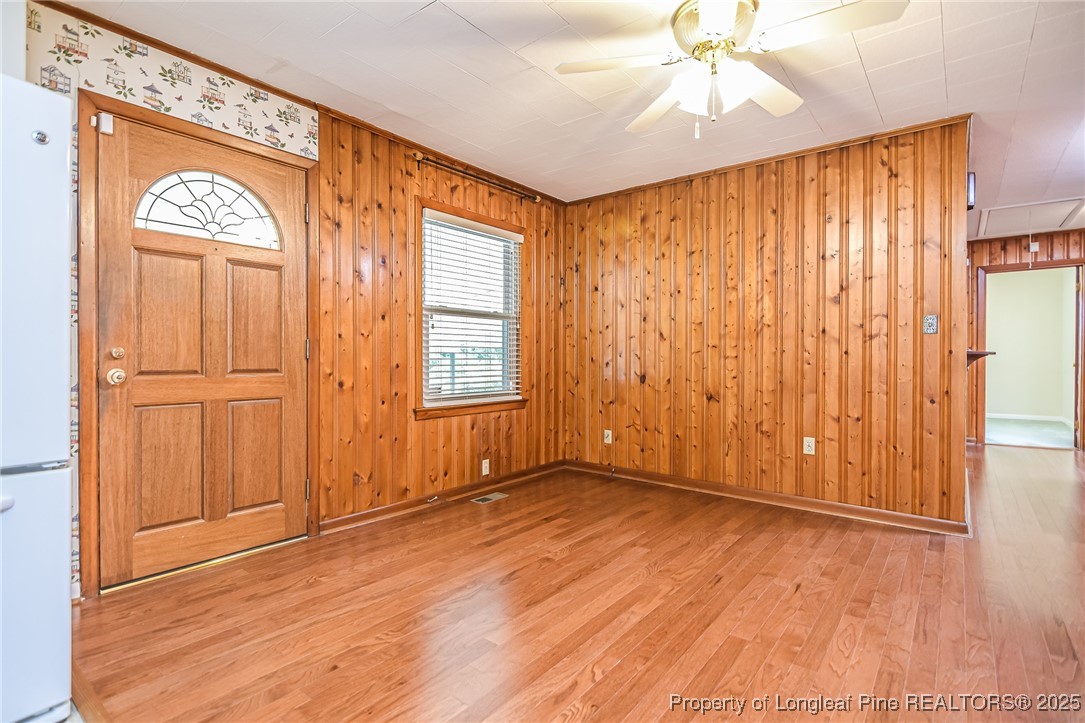 2067 Wade-Stedman Road Stedman, NC 28391 - Photo 3 of 29 a view of an empty room with window and wooden floor