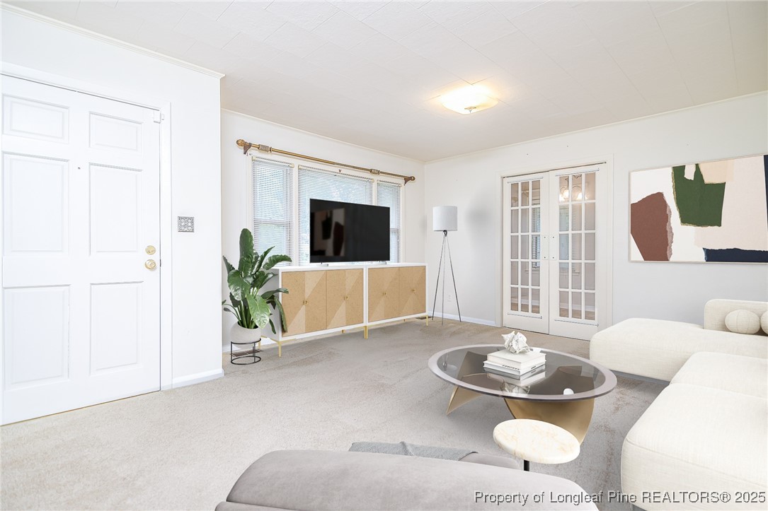 2067 Wade-Stedman Road Stedman, NC 28391 - Photo 8 of 29 a living room with furniture and a fireplace