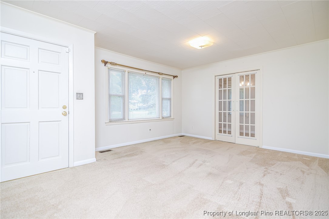2067 Wade-Stedman Road Stedman, NC 28391 - Photo 9 of 29 an empty room with windows
