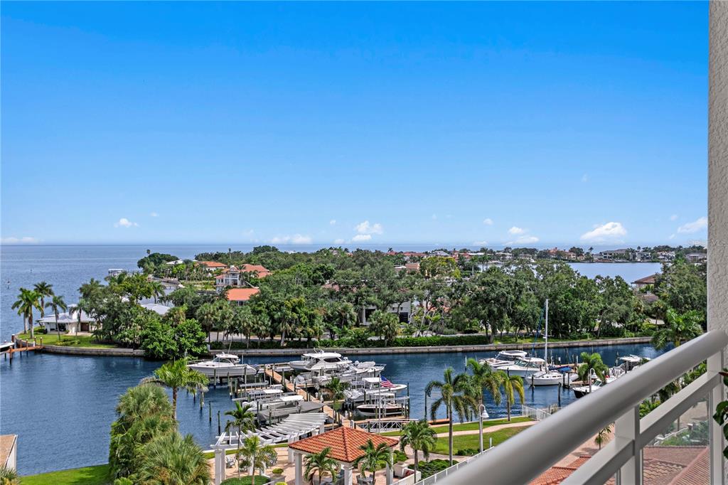 1325 Snell Isle Boulevard Northeast, Unit 711 St. Petersburg, FL 33704 - Photo 13 of 37 a view of a lake with a mountain in the background