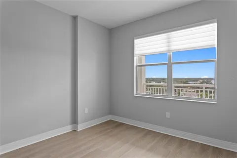 a room with furniture cabinets and a window