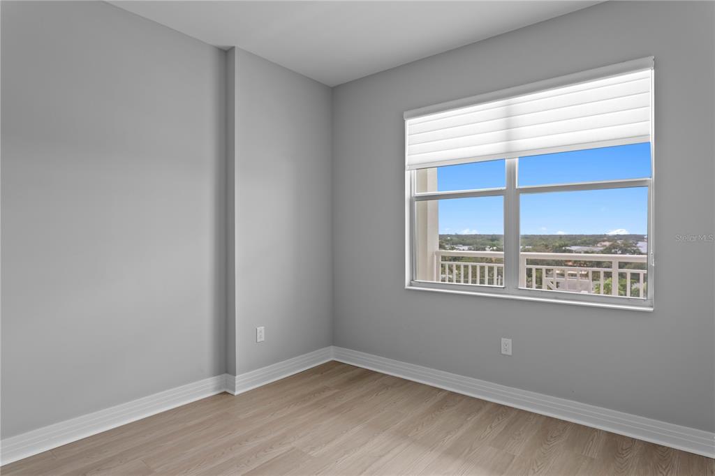 1325 Snell Isle Boulevard Northeast, Unit 711 St. Petersburg, FL 33704 - Photo 25 of 37 a view of an empty room with a window