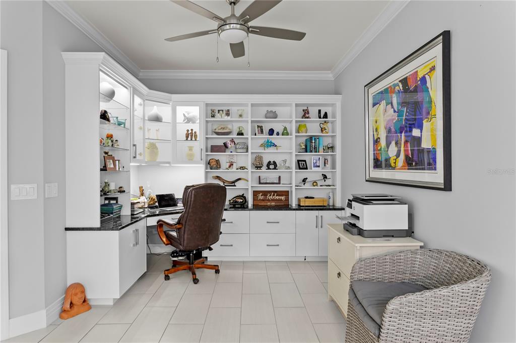 1325 Snell Isle Boulevard Northeast, Unit 711 St. Petersburg, FL 33704 - Photo 27 of 37 a room with furniture cabinets and a window