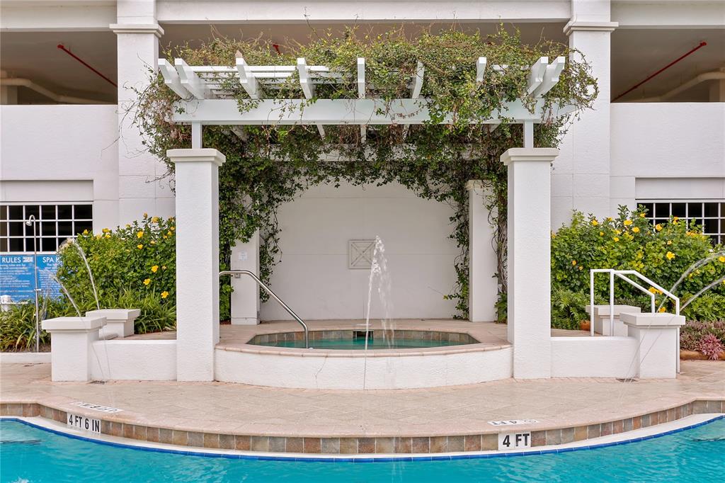 1325 Snell Isle Boulevard Northeast, Unit 711 St. Petersburg, FL 33704 - Photo 8 of 37 a view of a house with outdoor space