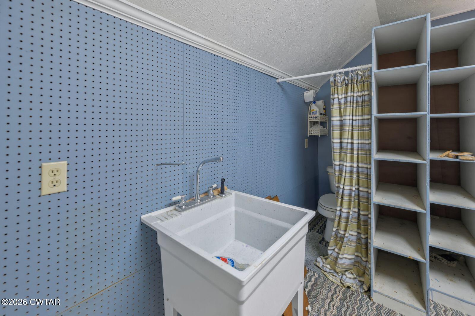 4110 Corinth Road Lexington, TN 38351 - Photo 38 of 59 a utility room with a shower