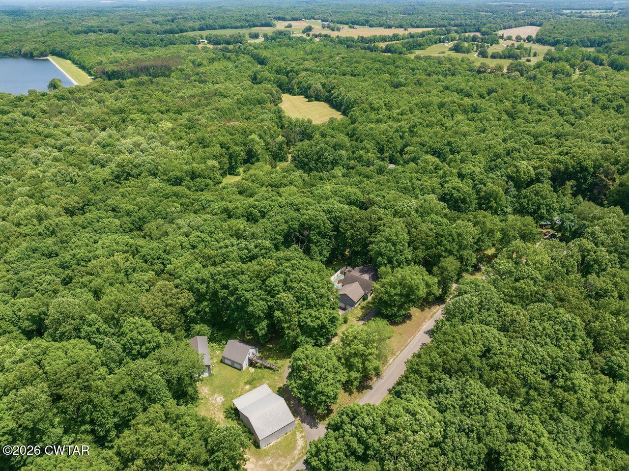 4110 Corinth Road Lexington, TN 38351 - Photo 46 of 59 an aerial view of a house with a yard