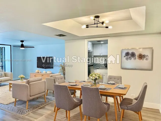 a view of a dining room with furniture