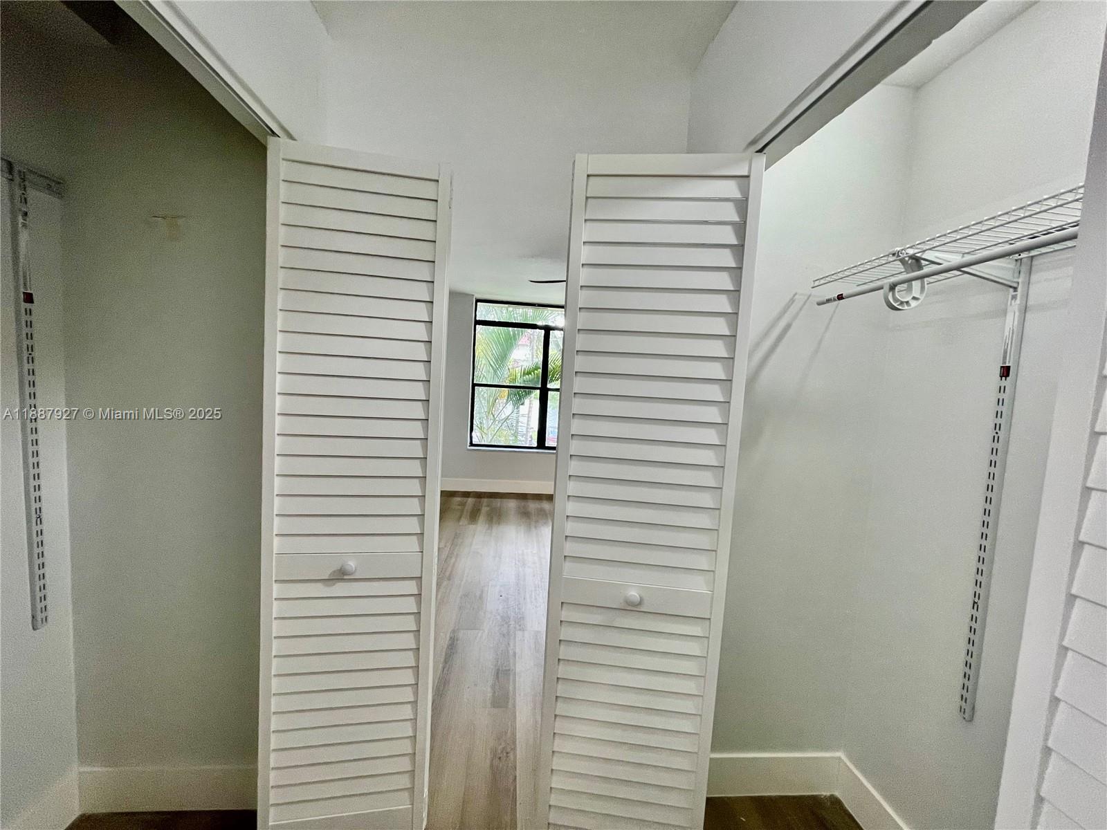 3680 Inverrary Drive, Unit 2B Lauderhill, FL 33319 - Photo 9 of 12 a bathroom with a shower and a window