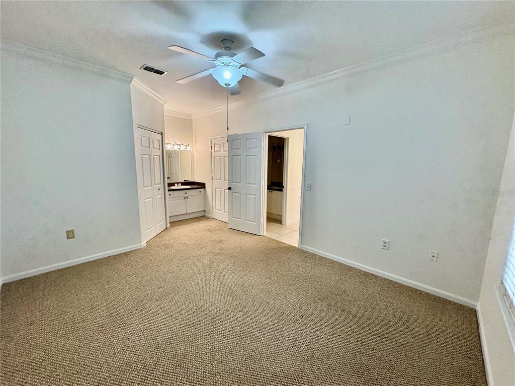 2199 Chianti Place, Unit 912 Palm Harbor, FL 34683 - Photo 7 of 20 a view of an empty room with a window