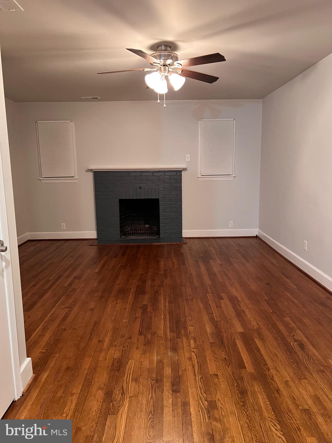 328 Bryan Place Hagerstown, MD 21740 - Photo 13 of 24 wooden floor fireplace and windows in an empty room