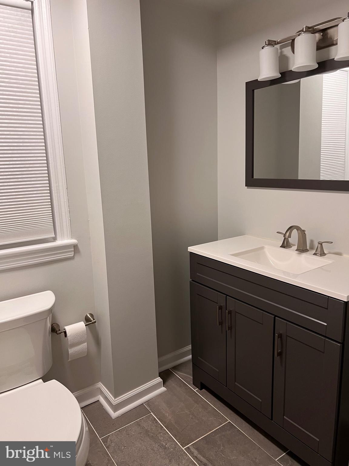 328 Bryan Place Hagerstown, MD 21740 - Photo 14 of 24 a bathroom with a sink and a mirror