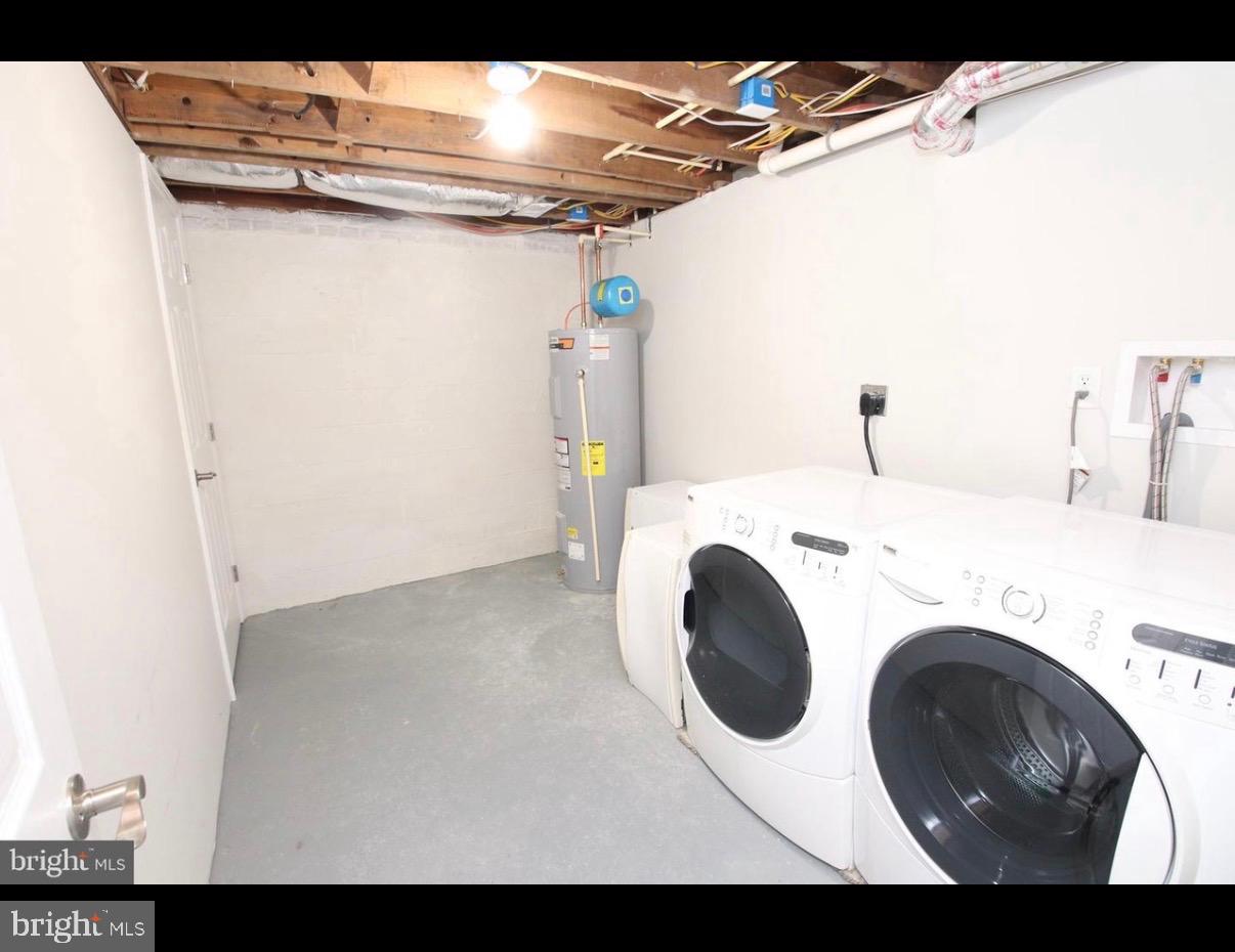 328 Bryan Place Hagerstown, MD 21740 - Photo 21 of 24 a utility room with dryer and washer