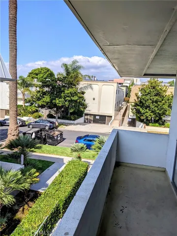 a view of swimming pool from a balcony