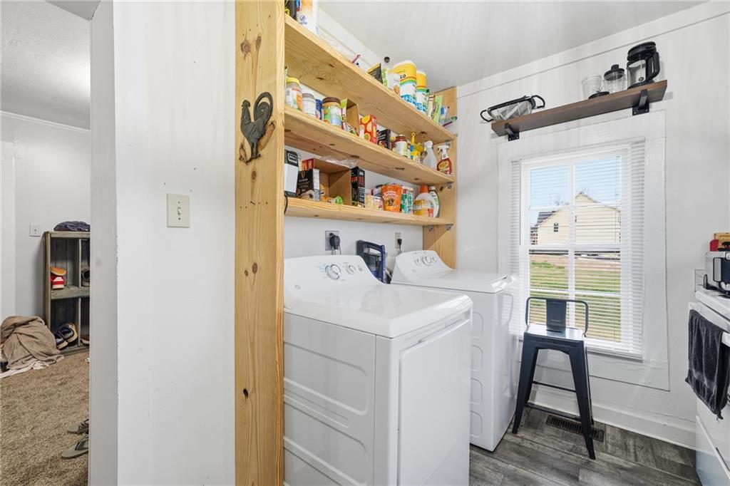 508 Old Canton Road Ball Ground, GA 30107 - Photo 20 of 28 a utility room with dryer and washer