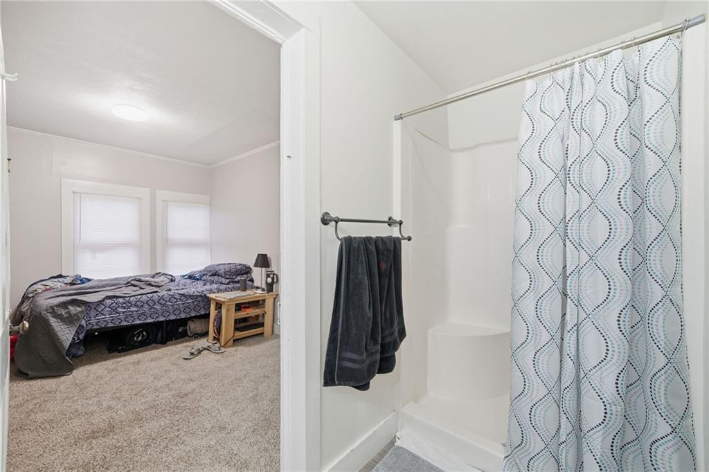 508 Old Canton Road Ball Ground, GA 30107 - Photo 23 of 28 a bedroom with a bed and a window