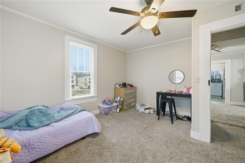 508 Old Canton Road Ball Ground, GA 30107 - Photo 25 of 28 a bedroom with furniture and a window