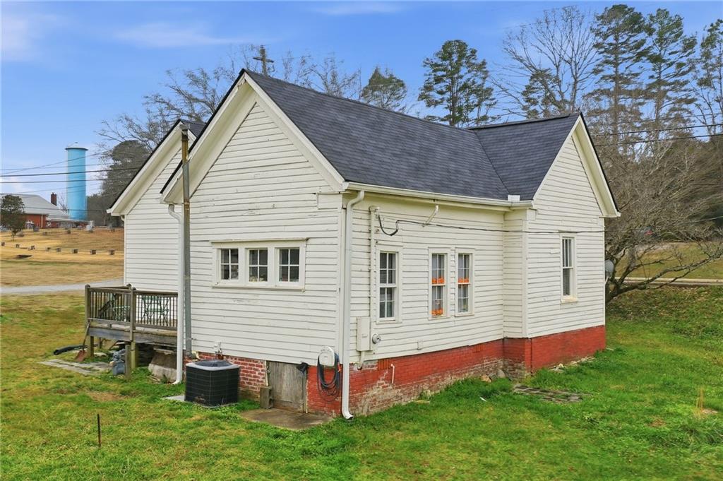 508 Old Canton Road Ball Ground, GA 30107 - Photo 6 of 28 a view of a house with a yard