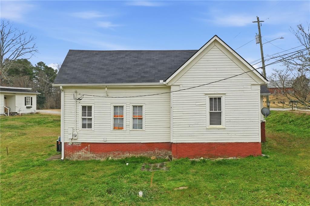 508 Old Canton Road Ball Ground, GA 30107 - Photo 7 of 28 a front view of house with yard