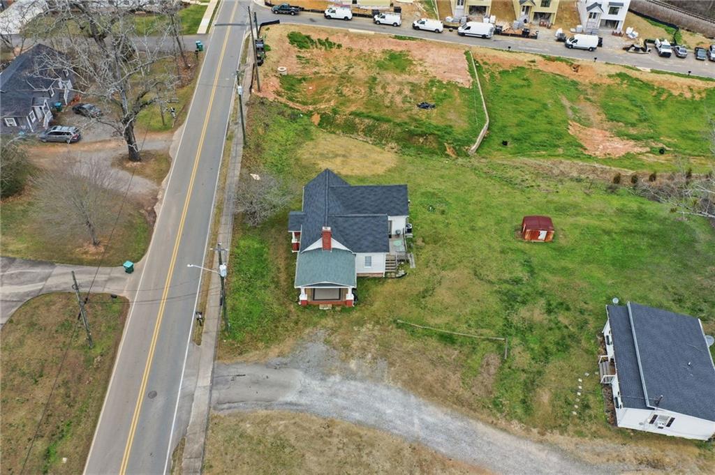 508 Old Canton Road Ball Ground, GA 30107 - Photo 10 of 28 an aerial view of a house with outdoor space